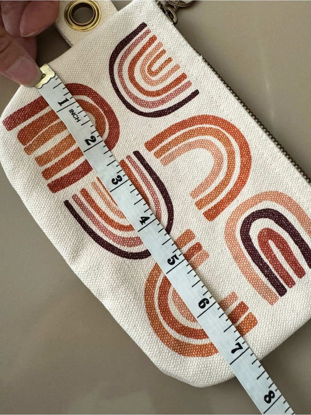 Danica Studio canvas zip pouch with terracotta rainbow screen-print design